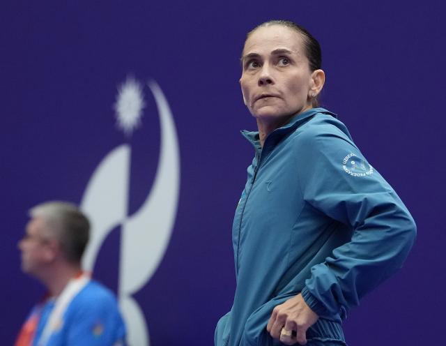 (260922) -- NAGOYA, Sept. 22, 2026 (Xinhua) -- Oksana Chusovitina of Uzbekistan is seen before the women's vault qualification of Artistic Gymnastics at the 20th Asian Games Aichi-Nagoya 2026 in Nagoya, Japan, Sept. 22, 2026. (Xinhua/Lui Siu Wai)