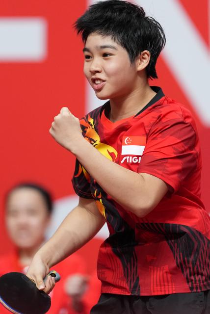 (260922) -- TOYOTA, Sept. 22, 2026 (Xinhua) -- Loy Ming Ying of Singapore celebrates during the table tennis women's team first-round match between Hong Kong, China and Singapore at the 20th Asian Games Aichi-Nagoya 2026 in Toyota, Japan, Sept. 22, 2026. (Xinhua/Cheong Kam Ka)