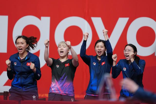 (260922) -- TOYOTA, Sept. 22, 2026 (Xinhua) -- Players of Hong Kong, China celebrate during the table tennis women's team first-round match between Hong Kong, China and Singapore at the 20th Asian Games Aichi-Nagoya 2026 in Toyota, Japan, Sept. 22, 2026. (Xinhua/Cheong Kam Ka)