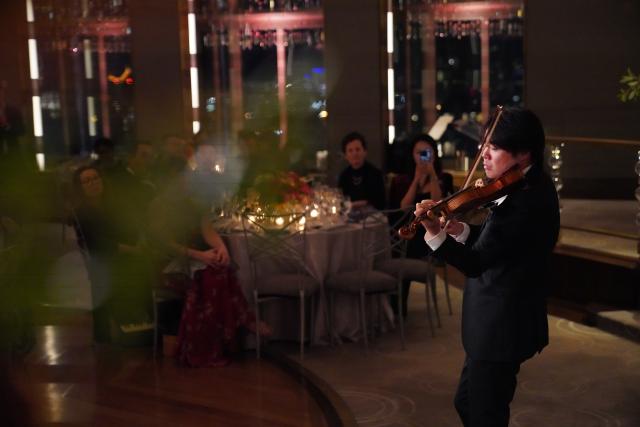 (260922) -- NEW YORK, Sept. 22, 2026 (Xinhua) -- Violinist Huang Mengla performs during a concert named Moonlit Melodies to celebrate the upcoming Mid-Autumn Festival at the Rainbow Room of Rockefeller Center in New York, the United States, on Sept. 21, 2026. The Mid-Autumn Festival in China, which is celebrated annually on the 15th day of the eighth month in the Chinese lunar calendar, falls on Sept. 25 this year. (Xinhua/Zhang Fengguo)
