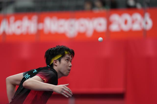 (260922) -- TOYOTA, Sept. 22, 2026 (Xinhua) -- Wang Chuqin of China serves to Thitaphat Preechayan of Thailand during the men's team quarterfinal match between China and Thailand at the 20th Asian Games Aichi-Nagoya 2026 in Toyota, Japan, Sept. 22, 2026. (Xinhua/Cheong Kam Ka)