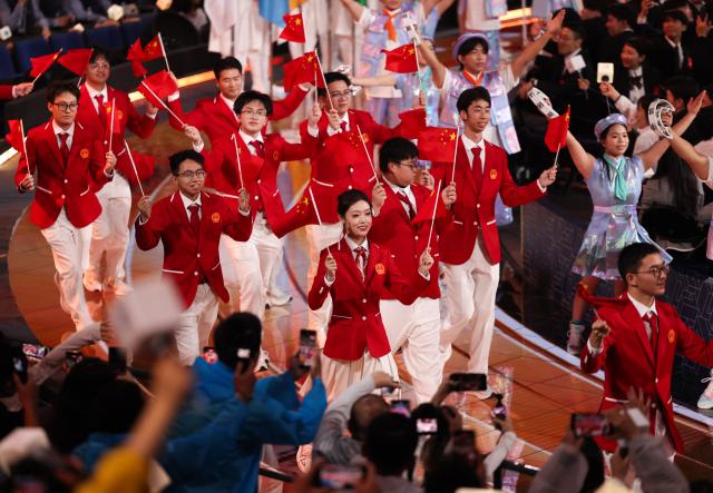 (260922) -- SHANGHAI, Sept. 22, 2026 (Xinhua) -- Members of Chinese delegation attend the opening ceremony of the 48th WorldSkills Competition in east China's Shanghai, Sept. 22, 2026. The 48th WorldSkills Competition opened in Shanghai on Tuesday evening, with 1,385 competitors from 68 countries and regions vying in 64 skill events. (Xinhua/Jin Liwang)