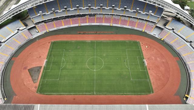 (260922) -- SAN JOSE, Sept. 22, 2026 (Xinhua) -- This aerial drone photo shows the China-aided National Stadium of Costa Rica in San Jose, Costa Rica, Sept. 22, 2026. With a standard football pitch, an athletics track and supporting facilities, the National Stadium of Costa Rica can accommodate about 35,000 spectators. (Xinhua/Liu Wenhui)