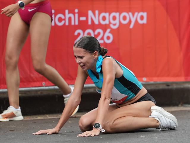 (260923) -- NAGOYA, Sept. 23, 2026 (Xinhua) -- Kristina Morozova of Kazakhstan reacts after the Women's Half Marathon Race Walk Final of Athletics at the 20th Asian Games Aichi-Nagoya 2026 in Nagoya, Japan, Sept. 23, 2026. (Xinhua/Jia Yuchen)