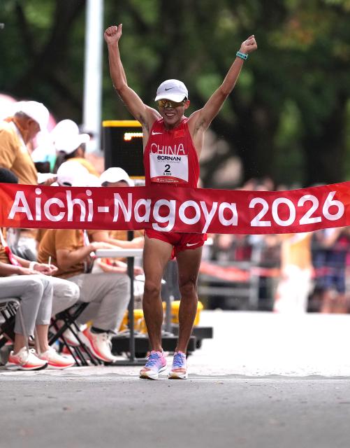 (260923) -- NAGOYA, Sept. 23, 2026 (Xinhua) -- Shi Shengji of China crosses the finish line during the Men's Half Marathon Race Walk Final of Athletics at the 20th Asian Games Aichi-Nagoya 2026 in Nagoya, Japan, Sept. 23, 2026. (Xinhua/Luo Yuan)