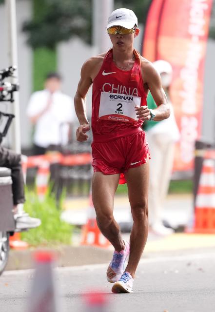 (260923) -- NAGOYA, Sept. 23, 2026 (Xinhua) -- Shi Shengji of China competes during the Men's Half Marathon Race Walk Final of Athletics at the 20th Asian Games Aichi-Nagoya 2026 in Nagoya, Japan, Sept. 23, 2026. (Xinhua/Luo Yuan)