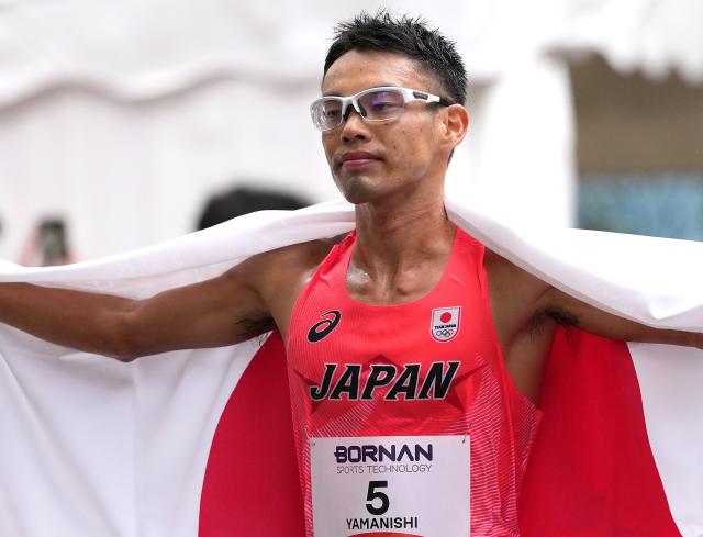 (260923) -- NAGOYA, Sept. 23, 2026 (Xinhua) -- Yamanishi Toshikazu of Japan celebrates after the Men's Half Marathon Race Walk Final of Athletics at the 20th Asian Games Aichi-Nagoya 2026 in Nagoya, Japan, Sept. 23, 2026. (Xinhua/Luo Yuan)
