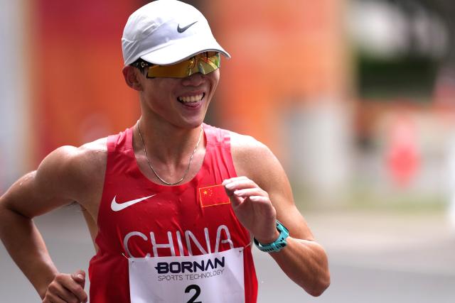 (260923) -- NAGOYA, Sept. 23, 2026 (Xinhua) -- Shi Shengji of China competes during the Men's Half Marathon Race Walk Final of Athletics at the 20th Asian Games Aichi-Nagoya 2026 in Nagoya, Japan, Sept. 23, 2026. (Xinhua/Luo Yuan)