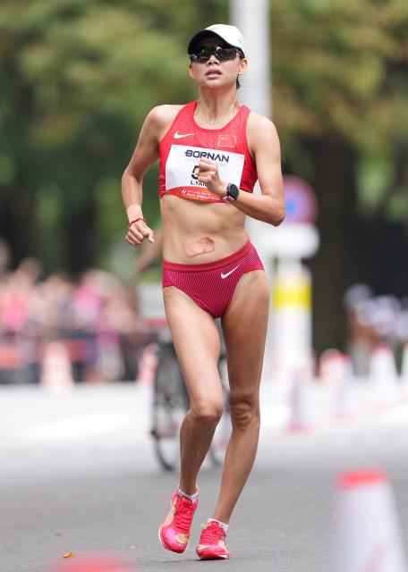 (260923) -- NAGOYA, Sept. 23, 2026 (Xinhua) -- Yang Liujing of China competes during the Women's Half Marathon Race Walk Final of Athletics at the 20th Asian Games Aichi-Nagoya 2026 in Nagoya, Japan, Sept. 23, 2026. (Xinhua/Luo Yuan)