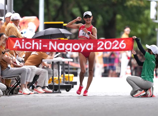 (260923) -- NAGOYA, Sept. 23, 2026 (Xinhua) -- Yang Liujing of China crosses the finish line during the Women's Half Marathon Race Walk Final of Athletics at the 20th Asian Games Aichi-Nagoya 2026 in Nagoya, Japan, Sept. 23, 2026. (Xinhua/Luo Yuan)