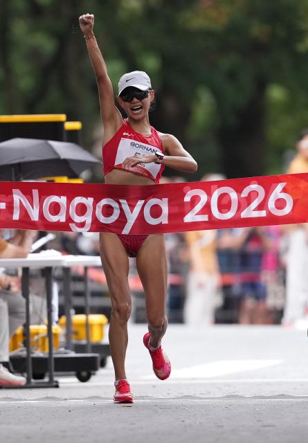 (260923) -- NAGOYA, Sept. 23, 2026 (Xinhua) -- Yang Liujing of China crosses the finish line during the Women's Half Marathon Race Walk Final of Athletics at the 20th Asian Games Aichi-Nagoya 2026 in Nagoya, Japan, Sept. 23, 2026. (Xinhua/Luo Yuan)