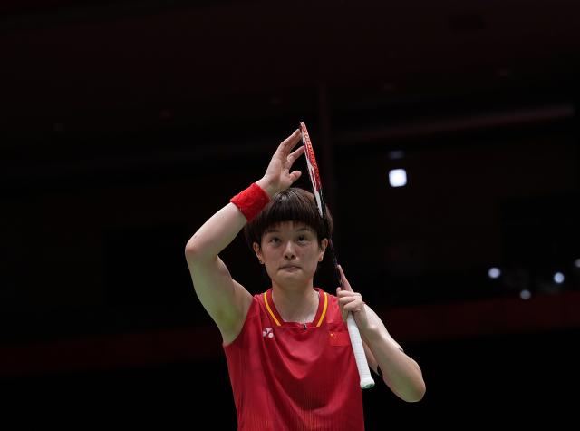 (260923) -- ICHINOMIYA, Sept. 23, 2026 (Xinhua) -- Wang Zhiyi of team China greets spectators after the singles match against Putri Kusuma Wardani of team Indonesia during the badminton women's team semifinals between China and Indonesia at the 20th Asian Games Aichi-Nagoya 2026 in Ichinomiya of Aichi Prefecture, Japan, Sept. 23, 2026. (Xinhua/Li Bo)