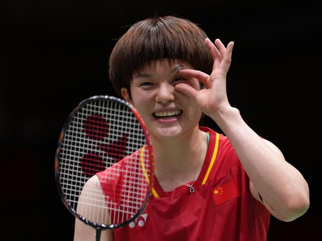(260923) -- ICHINOMIYA, Sept. 23, 2026 (Xinhua) -- Wang Zhiyi of team China celebrates after winning the singles match against Putri Kusuma Wardani of team Indonesia during the badminton women's team semifinals between China and Indonesia at the 20th Asian Games Aichi-Nagoya 2026 in Ichinomiya of Aichi Prefecture, Japan, Sept. 23, 2026. (Xinhua/Li Bo)