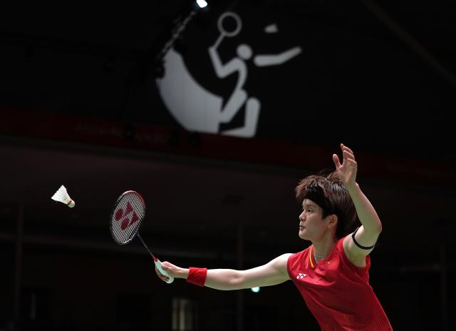 (260923) -- ICHINOMIYA, Sept. 23, 2026 (Xinhua) -- Wang Zhiyi of team China competes in the singles match against Putri Kusuma Wardani of team Indonesia during the badminton women's team semifinals between China and Indonesia at the 20th Asian Games Aichi-Nagoya 2026 in Ichinomiya of Aichi Prefecture, Japan, Sept. 23, 2026. (Xinhua/Li Bo)