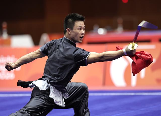 (260923) -- NAGOYA, Sept. 23, 2026 (Xinhua) -- Gao Xiaobin of China competes during the Daoshu round of the Men's Daoshu and Gunshu Final of Wushu at the 20th Asian Games Aichi-Nagoya 2026 in Nagoya, Japan, Sept. 23, 2026. (Xinhua/Long Lei)
