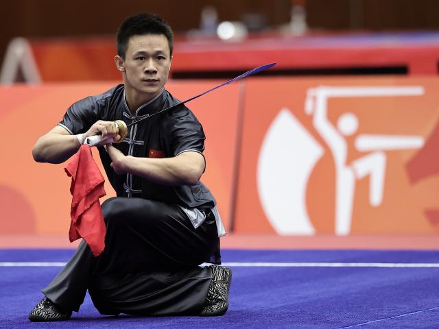 (260923) -- NAGOYA, Sept. 23, 2026 (Xinhua) -- Gao Xiaobin of China competes during the Daoshu round of the Men's Daoshu and Gunshu Final of Wushu at the 20th Asian Games Aichi-Nagoya 2026 in Nagoya, Japan, Sept. 23, 2026. (Xinhua/Long Lei)