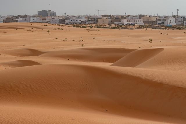 (260923) -- NOUAKCHOTT, Sept. 23, 2026 (Xinhua) -- This photo taken on Sept. 22, 2026 shows a view of Nouakchott, capital of Mauritania, and the Sahara Desert. (Xinhua/Xie Jianfei)