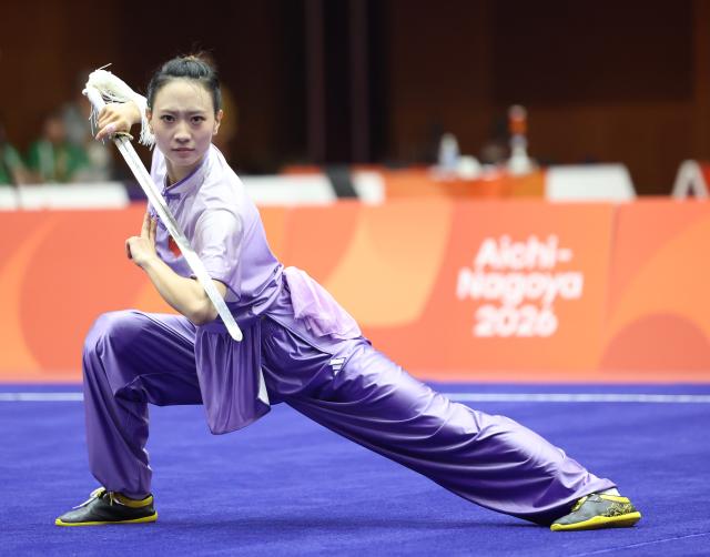 (260923) -- NAGOYA, Sept. 23, 2026 (Xinhua) -- Yao Yang of China competes during the Jianshu round of the Women's Jianshu and Qiangshu of Wushu at the 20th Asian Games Aichi-Nagoya 2026 in Nagoya, Japan, Sept. 23, 2026. (Xinhua/Long Lei)