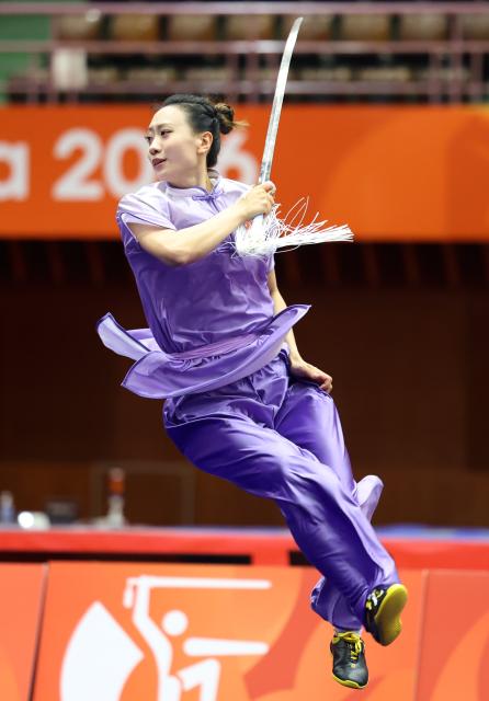 (260923) -- NAGOYA, Sept. 23, 2026 (Xinhua) -- Yao Yang of China competes during the Jianshu round of the Women's Jianshu and Qiangshu of Wushu at the 20th Asian Games Aichi-Nagoya 2026 in Nagoya, Japan, Sept. 23, 2026. (Xinhua/Long Lei)