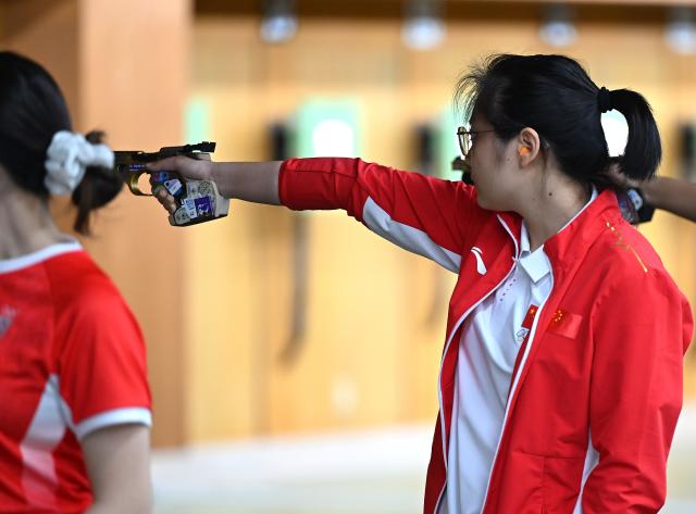 (260923) -- NAGOYA, Sept. 23, 2026 (Xinhua) -- Jiang Ranxin of China competes during the 10m air pistol women individual qualification and team final at the 20th Asian Games Aichi-Nagoya 2026 in Toyota of Aichi Prefecture, Japan, Sept. 23, 2026. (Xinhua/Liu Lei)