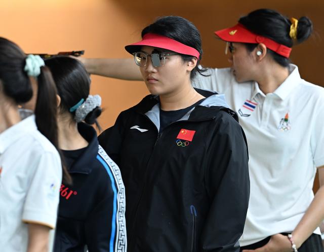 (260923) -- NAGOYA, Sept. 23, 2026 (Xinhua) -- Shen Yiyao (2nd R) of China competes during the 10m air pistol women individual qualification and team final at the 20th Asian Games Aichi-Nagoya 2026 in Toyota of Aichi Prefecture, Japan, Sept. 23, 2026. (Xinhua/Liu Lei)