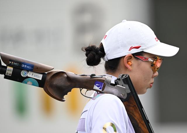 (260923) -- NAGOYA, Sept. 23, 2026 (Xinhua) -- Jiang Chaoyu of China reacts during the Skeet women individual qualification and team final of shooting at the 20th Asian Games Aichi-Nagoya 2026 in Toyota of Aichi Prefecture, Japan, Sept. 23, 2026. (Xinhua/Liu Lei)