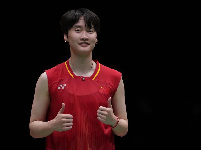 (260923) -- ICHINOMIYA, Sept. 23, 2026 (Xinhua) -- Chen Yufei of team China poses after winning the singles match against Mutiara Ayu Puspitasari of team Indonesia during the badminton women's team semifinals between China and Indonesia at the 20th Asian Games Aichi-Nagoya 2026 in Ichinomiya of Aichi Prefecture, Japan, Sept. 23, 2026. (Xinhua/Li Bo)