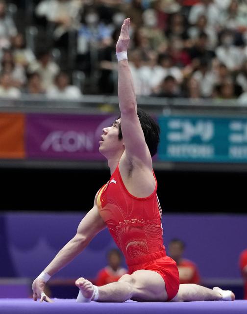 (260923) -- NAGOYA, Sept. 23, 2026 (Xinhua) -- Zhang Boheng of team China competes during the floor exercise competition of men's team final of Artistic Gymnastics at the 20th Asian Games Aichi-Nagoya 2026 in Nagoya, Japan, Sept. 23, 2026. (Xinhua/Lui Siu Wai)