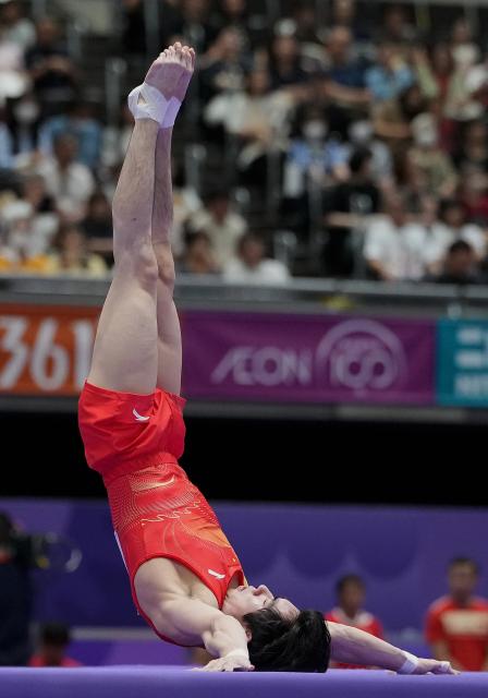 (260923) -- NAGOYA, Sept. 23, 2026 (Xinhua) -- Zhang Boheng of team China competes during the floor exercise competition of men's team final of Artistic Gymnastics at the 20th Asian Games Aichi-Nagoya 2026 in Nagoya, Japan, Sept. 23, 2026. (Xinhua/Lui Siu Wai)