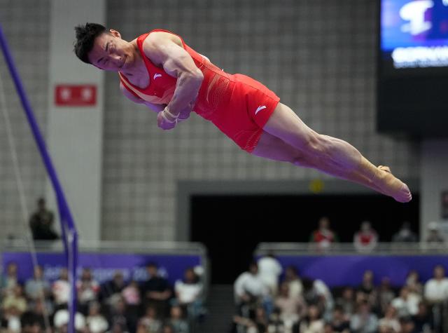 (260923) -- NAGOYA, Sept. 23, 2026 (Xinhua) -- Sun Wei of team China competes during the floor exercise competition of men's team final of Artistic Gymnastics at the 20th Asian Games Aichi-Nagoya 2026 in Nagoya, Japan, Sept. 23, 2026. (Xinhua/Lui Siu Wai)