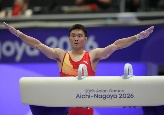 (260923) -- NAGOYA, Sept. 23, 2026 (Xinhua) -- Sun Wei of team China reacts during the pommel horse competition of men's team final of Artistic Gymnastics at the 20th Asian Games Aichi-Nagoya 2026 in Nagoya, Japan, Sept. 23, 2026. (Xinhua/Lui Siu Wai)
