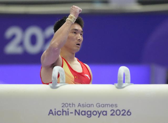 (260923) -- NAGOYA, Sept. 23, 2026 (Xinhua) -- Sun Wei of team China reacts during the pommel horse competition of men's team final of Artistic Gymnastics at the 20th Asian Games Aichi-Nagoya 2026 in Nagoya, Japan, Sept. 23, 2026. (Xinhua/Lui Siu Wai)