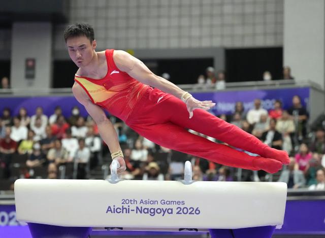 (260923) -- NAGOYA, Sept. 23, 2026 (Xinhua) -- Sun Wei of team China competes during the pommel horse competition of men's team final of Artistic Gymnastics at the 20th Asian Games Aichi-Nagoya 2026 in Nagoya, Japan, Sept. 23, 2026. (Xinhua/Jia Yuchen)