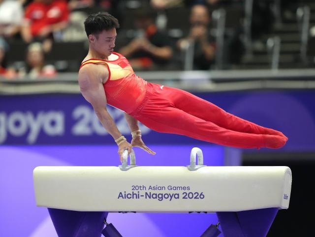 (260923) -- NAGOYA, Sept. 23, 2026 (Xinhua) -- Sun Wei of team China competes during the pommel horse competition of men's team final of Artistic Gymnastics at the 20th Asian Games Aichi-Nagoya 2026 in Nagoya, Japan, Sept. 23, 2026. (Xinhua/Lui Siu Wai)