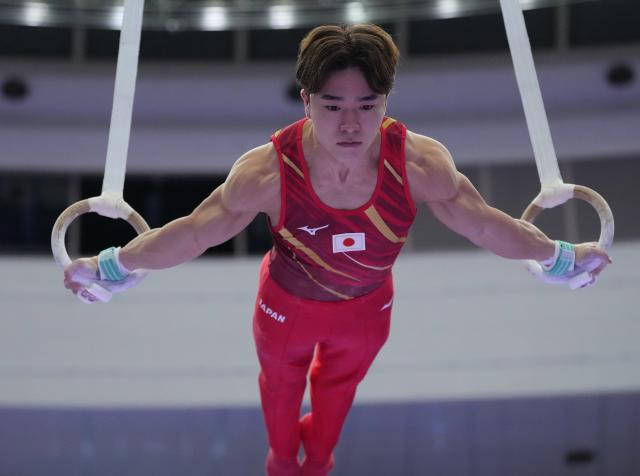 (260923) -- NAGOYA, Sept. 23, 2026 (Xinhua) -- Oka Shinnosuke of team Japan competes during the rings competition of men's team final of Artistic Gymnastics at the 20th Asian Games Aichi-Nagoya 2026 in Nagoya, Japan, Sept. 23, 2026. (Xinhua/Jia Yuchen)