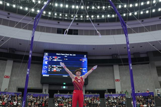(260923) -- NAGOYA, Sept. 23, 2026 (Xinhua) -- Kaneta Kiichi of team Japan reacts after the rings competition of men's team final of Artistic Gymnastics at the 20th Asian Games Aichi-Nagoya 2026 in Nagoya, Japan, Sept. 23, 2026. (Xinhua/Jia Yuchen)