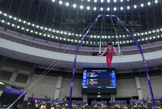 (260923) -- NAGOYA, Sept. 23, 2026 (Xinhua) -- Hashimoto Daiki of team Japan competes during the rings competition of men's team final of Artistic Gymnastics at the 20th Asian Games Aichi-Nagoya 2026 in Nagoya, Japan, Sept. 23, 2026. (Xinhua/Jia Yuchen)