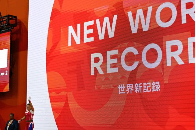 (260923) -- NAGOYA, Sept. 23, 2026 (Xinhua) -- Ri Song Gum of the Democratic People's Republic of Korea celebrates during the women's 49kg final of weightlifting at the 20th Asian Games Aichi-Nagoya 2026 in Nagoya, Japan, Sept. 23, 2026. (Xinhua/Yu Yang)