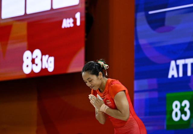 (260923) -- NAGOYA, Sept. 23, 2026 (Xinhua) -- Mirabai Chanu Saikhom of India reacts during the women's 49kg final of weightlifting at the 20th Asian Games Aichi-Nagoya 2026 in Nagoya, Japan, Sept. 23, 2026. (Xinhua/Yu Yang)