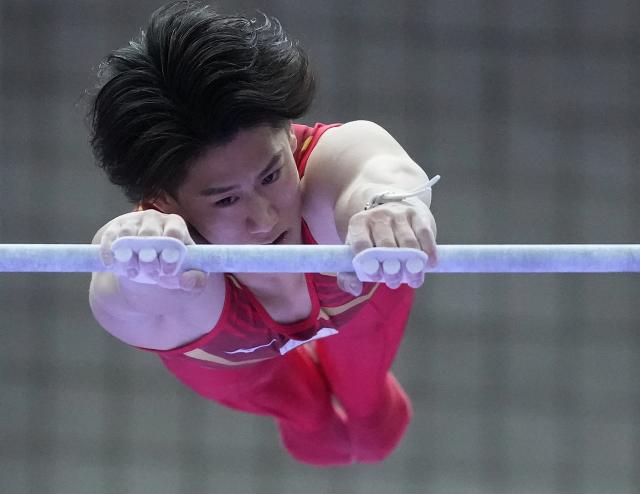 (260923) -- NAGOYA, Sept. 23, 2026 (Xinhua) -- Hashimoto Daiki of team Japan competes during the horizontal bar competition of men's team final of Artistic Gymnastics at the 20th Asian Games Aichi-Nagoya 2026 in Nagoya, Japan, Sept. 23, 2026. (Xinhua/Jia Yuchen)