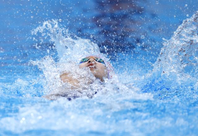 (260923) -- TOKYO, Sept. 23, 2026 (Xinhua) -- Kim Seungwon of South Korea competes during the women's 100m backstroke final at the 20th Asian Games Aichi-Nagoya 2026 in Tokyo, Japan, Sept. 23, 2026. (Xinhua/Wu Zhizun)