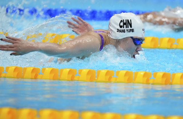 (260923) -- TOKYO, Sept. 23, 2026 (Xinhua) -- Zhang Yufei of China competes during the women's 100m butterfly final at the 20th Asian Games Aichi-Nagoya 2026 in Tokyo, Japan, Sept. 23, 2026. (Xinhua/Chen Zeguo)