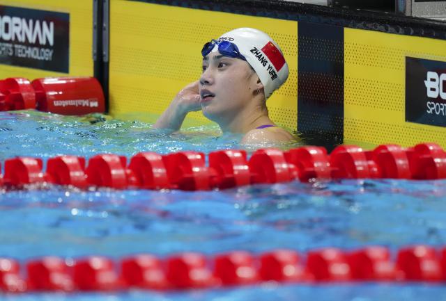 (260923) -- TOKYO, Sept. 23, 2026 (Xinhua) -- Zhang Yufei of China reacts after the women's 100m butterfly final at the 20th Asian Games Aichi-Nagoya 2026 in Tokyo, Japan, Sept. 23, 2026. (Xinhua/Chen Zeguo)