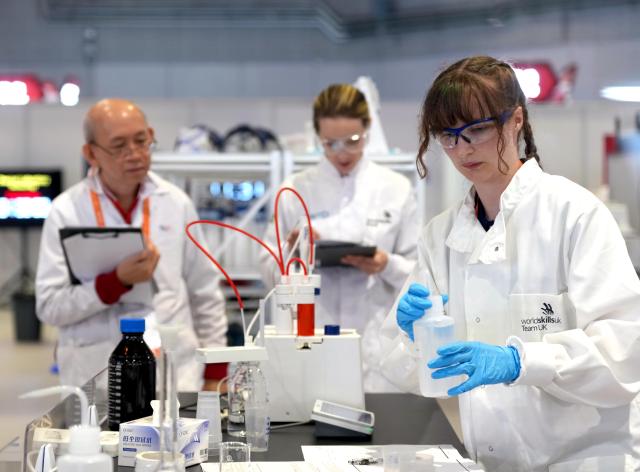 (260923) -- SHANGHAI, Sept. 23, 2026 (Xinhua) -- Contestants participate in the chemical laboratory technology event during the 48th WorldSkills Competition in east China's Shanghai, Sept. 23, 2026. The competition events started at the National Exhibition and Convention Center here on Wednesday. (Xinhua/Liu Ying)