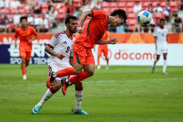 (260923) -- TOYOTA, Sept. 23, 2026 (Xinhua) -- Hu Hetao of China heads the ball during the group B match of Men's Football between China and the United Arab Emirates at 20th Asian Games Aichi-Nagoya 2026 in Toyota, Japan, Sept. 23, 2026. (Xinhua/Jia Haocheng)