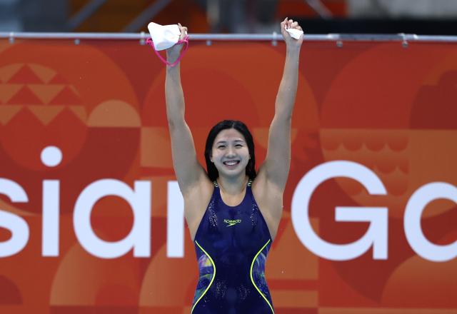 (260923) -- TOKYO, Sept. 23, 2026 (Xinhua) -- Tang Qianting of China celebrates after the women's 100m breaststroke final at the 20th Asian Games Aichi-Nagoya 2026 in Tokyo, Japan, Sept. 23, 2026. (Xinhua/Wu Zhizun)