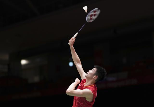 (260923) -- ICHINOMIYA, Sept. 23, 2026 (Xinhua) -- Li Shifeng of China returns the shot to Ayush Shetty of India during the men's team semifinal match of badminton between China and India at the 20th Asian Games Aichi-Nagoya 2026 in Ichinomiya of Aichi Prefecture, Japan, Sept. 23, 2026. (Xinhua/Li Bo)