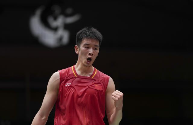 (260923) -- ICHINOMIYA, Sept. 23, 2026 (Xinhua) -- Li Shifeng of China celebrates during the men's team semifinal match of badminton between China and India at the 20th Asian Games Aichi-Nagoya 2026 in Ichinomiya of Aichi Prefecture, Japan, Sept. 23, 2026. (Xinhua/Li Bo)
