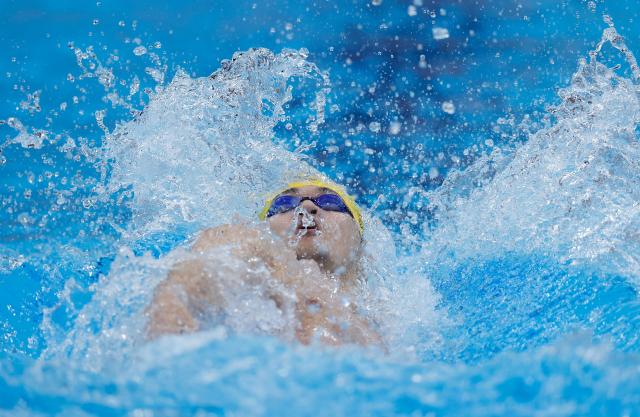 (260923) -- TOKYO, Sept. 23, 2026 (Xinhua) -- Xu Jiayu of China competes during the mixed 4x100m medley relay final at the 20th Asian Games Aichi-Nagoya 2026 in Tokyo, Japan, Sept. 23, 2026. (Xinhua/Wu Zhizun)