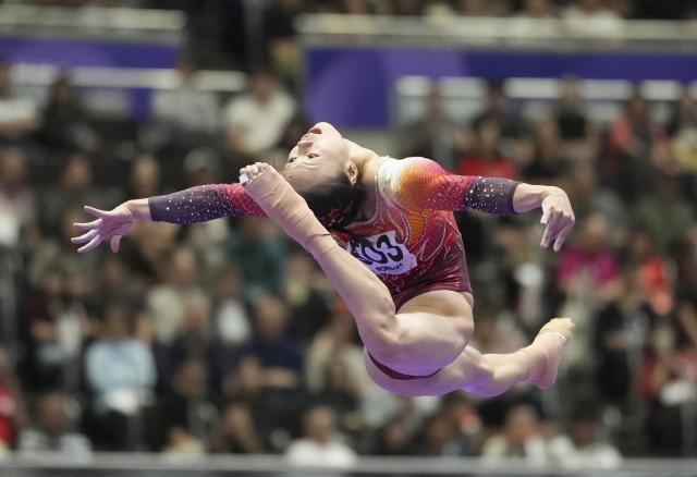 (260923) -- NAGOYA, Sept. 23, 2026 (Xinhua) -- Zhang Qingying of China competes during floor exercise competition of the women's team final of Artistic Gymnastics at the 20th Asian Games Aichi-Nagoya 2026 in Nagoya, Japan, Sept. 23, 2026. (Xinhua/Lui Siu Wai)